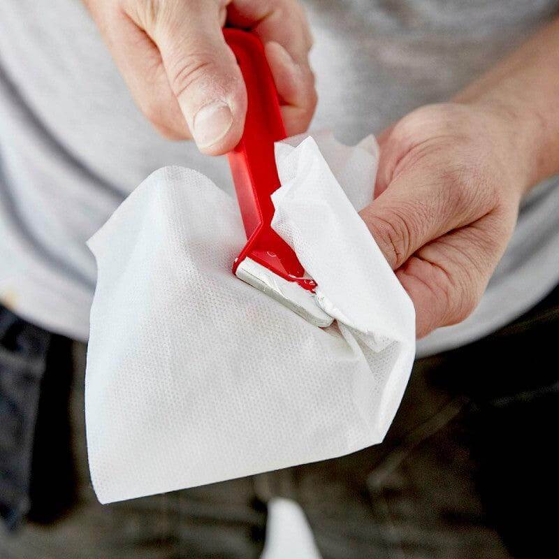 Using Soudal Swipex Wipes to clean tools effectively, removing uncured sealants, adhesives, and grime for a spotless finish. Ideal for professional or DIY tasks.