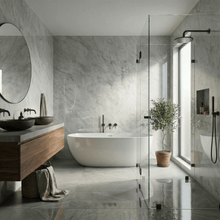Modern bathroom with a freestanding bathtub, glass shower enclosure, and wooden vanity.