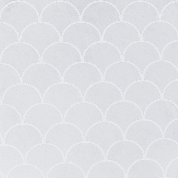 Close up of grey mermaid scallop pattern with soft satin surface and gentle texture