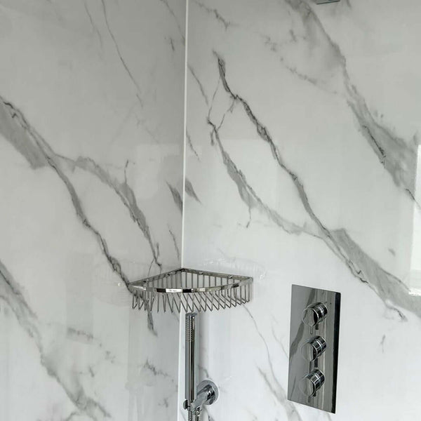 Stylish bathroom featuring White Matt Marble panels, offering a subtle marble effect with a matte finish. Ideal for a modern and elegant bathroom design.