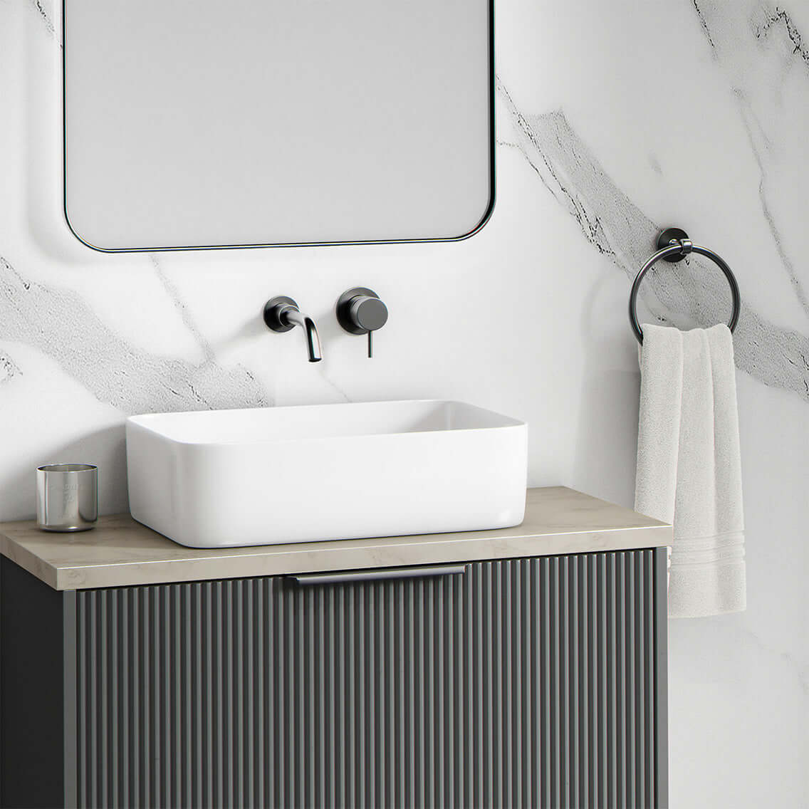 A modern bathroom featuring a freestanding white bath in front of white marble matt bathroom wall panels with soft grey veining. Natural lighting and soft shadows highlight the realistic stone texture of the shower panels, making this a stylish and practical example of shower cladding as a tile alternative